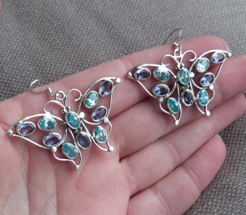 Zilveren oorbellen vlinder gezet met Ioliet en blauw Topaas